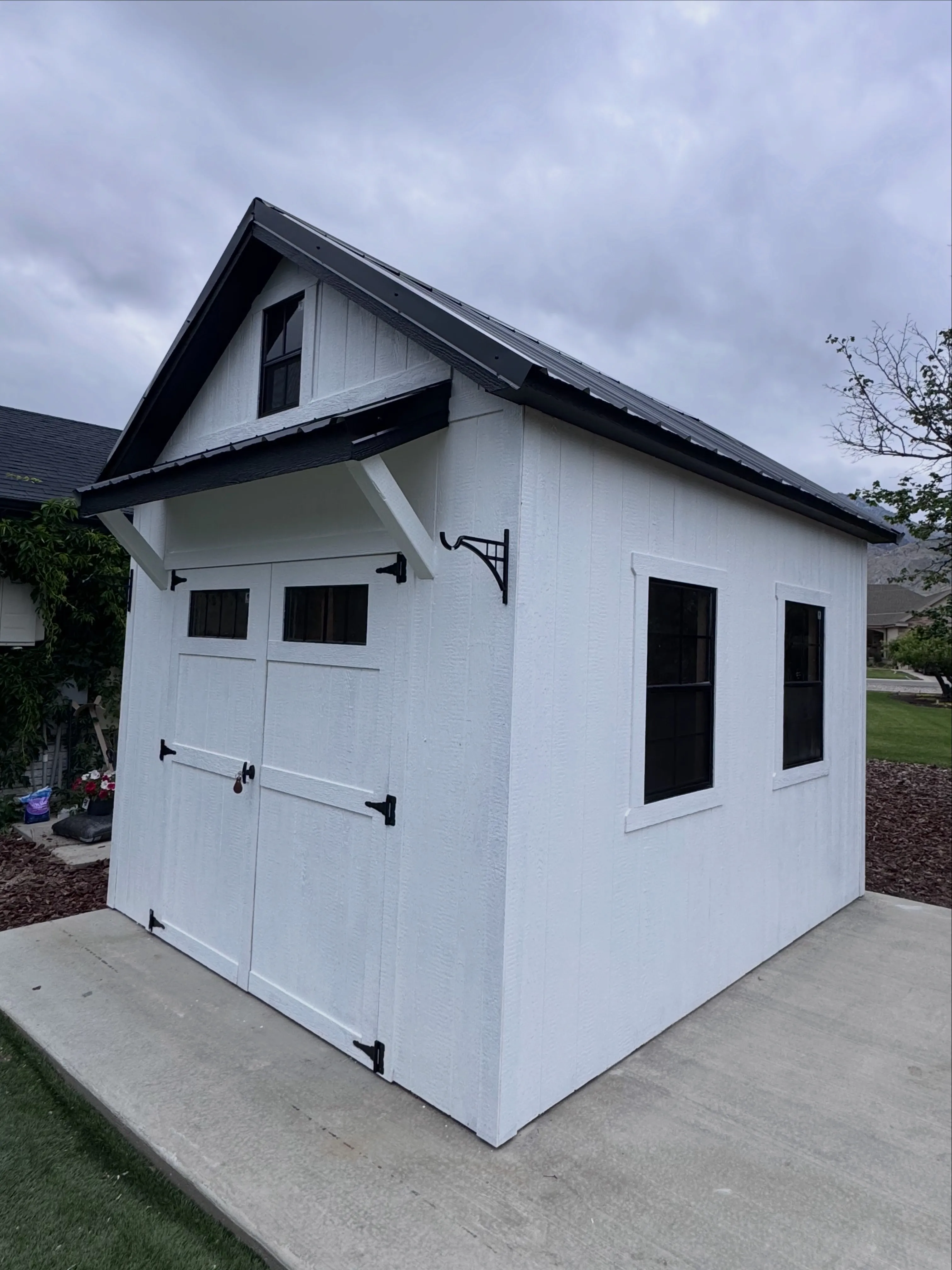 Custom shed with metal roof adding property value Utah