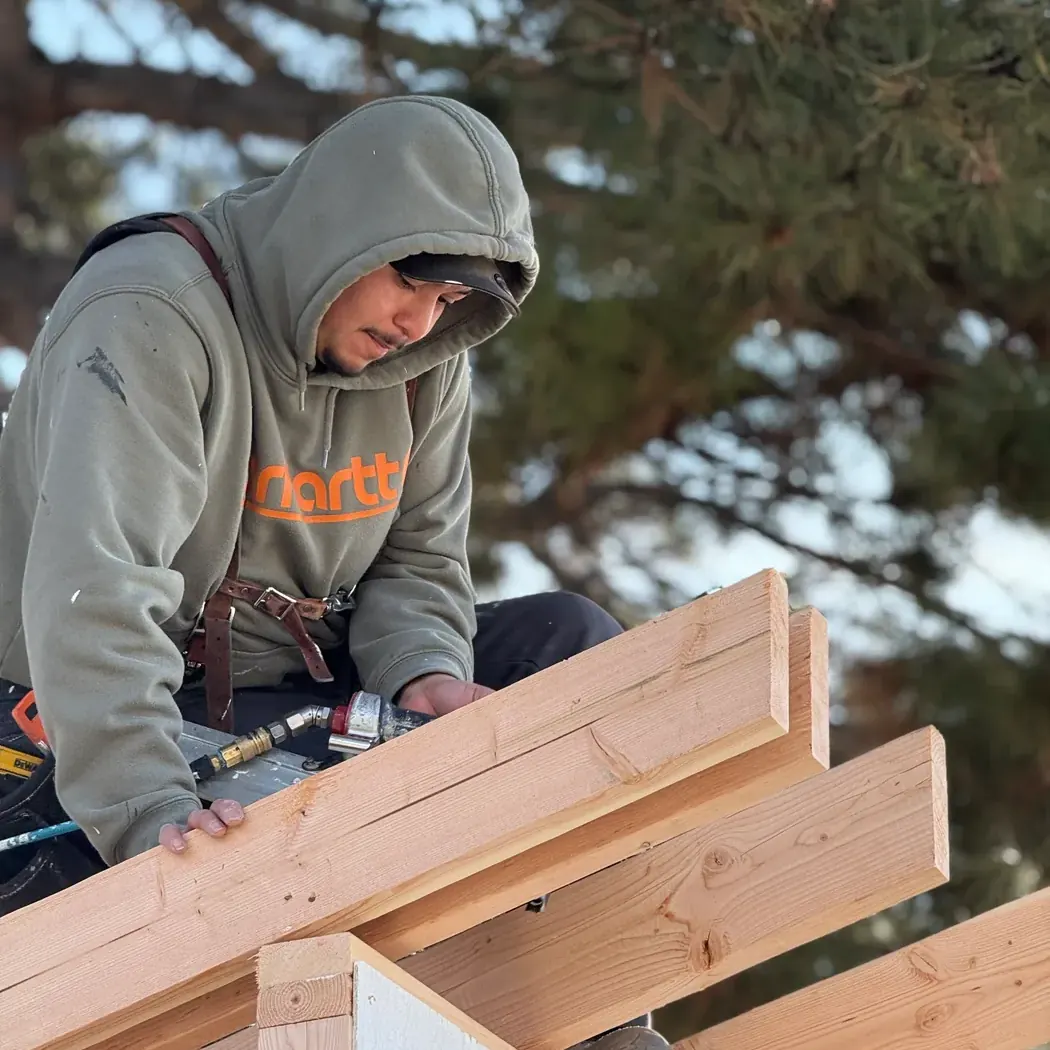 ShedPro crew installing roof on custom shed