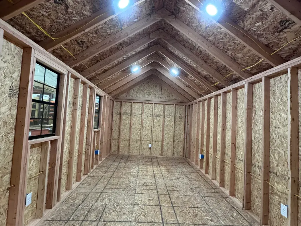 Shed interior with lighting and electrical outlets
