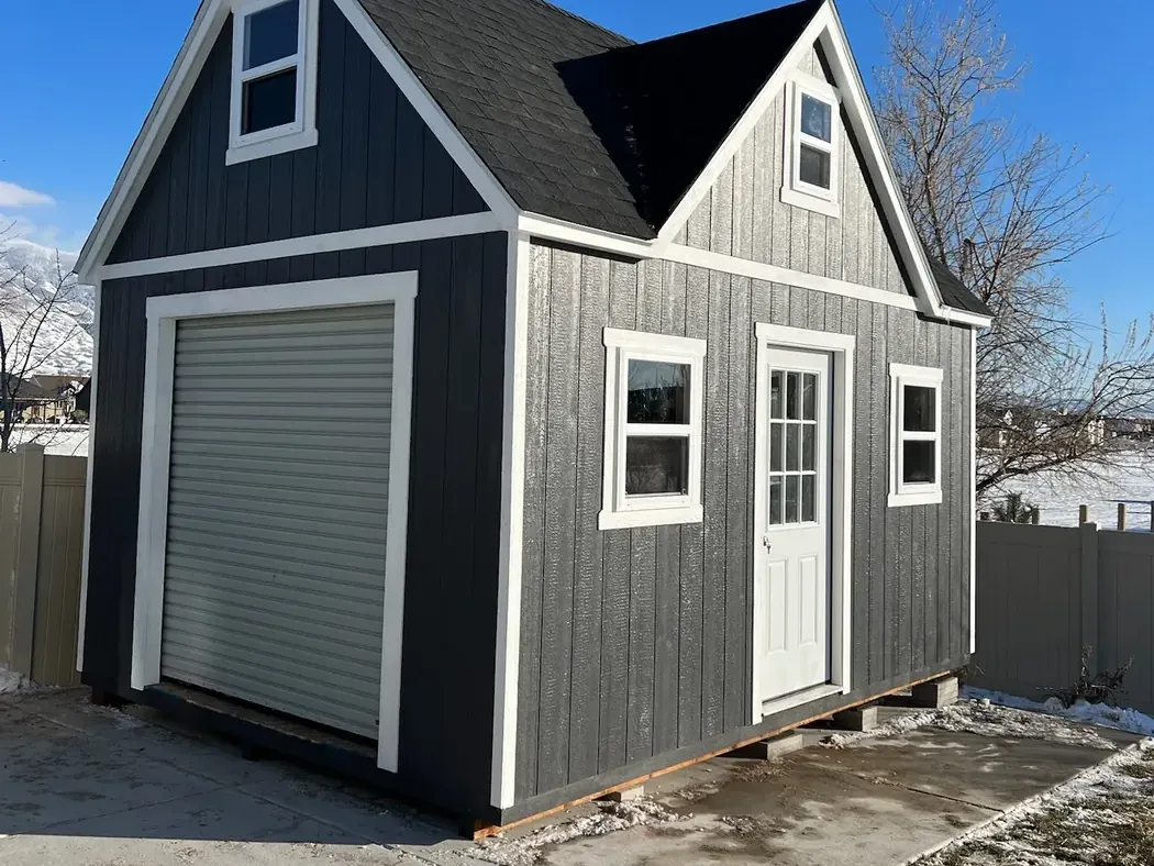 Dark gray 3-Peak shed built by ShedPro LLC Utah